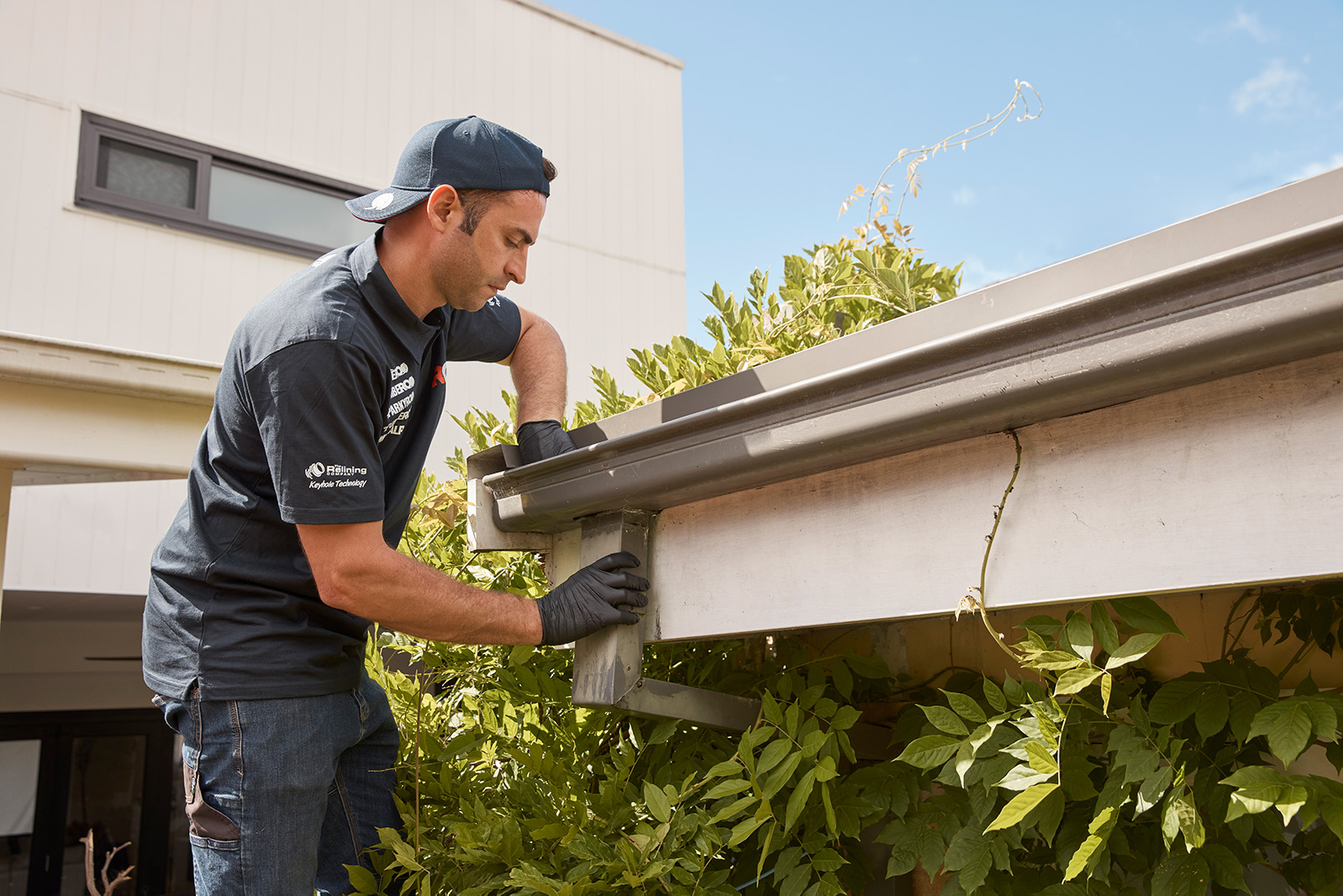 plumber fixing roof plumbing